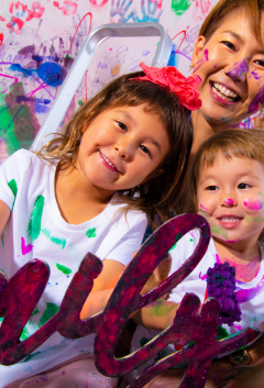 Child painting at Artnest kids art class