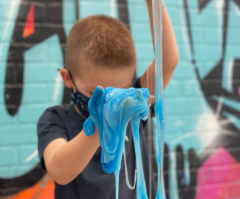 Child painting at Artnest kids art class